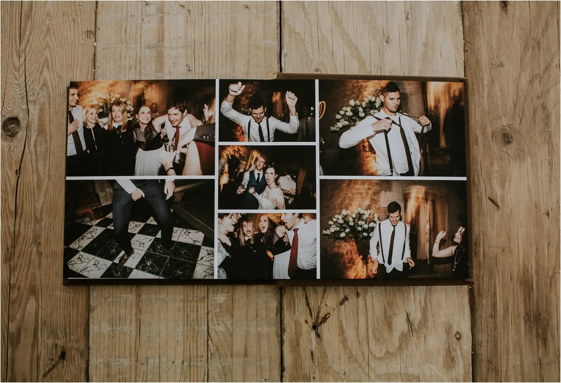 An open album spread showing a grid of black and white reception photographs