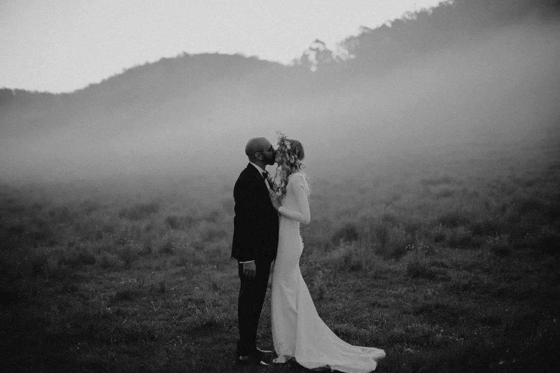 Black and white portrait of a couple in heavy mist